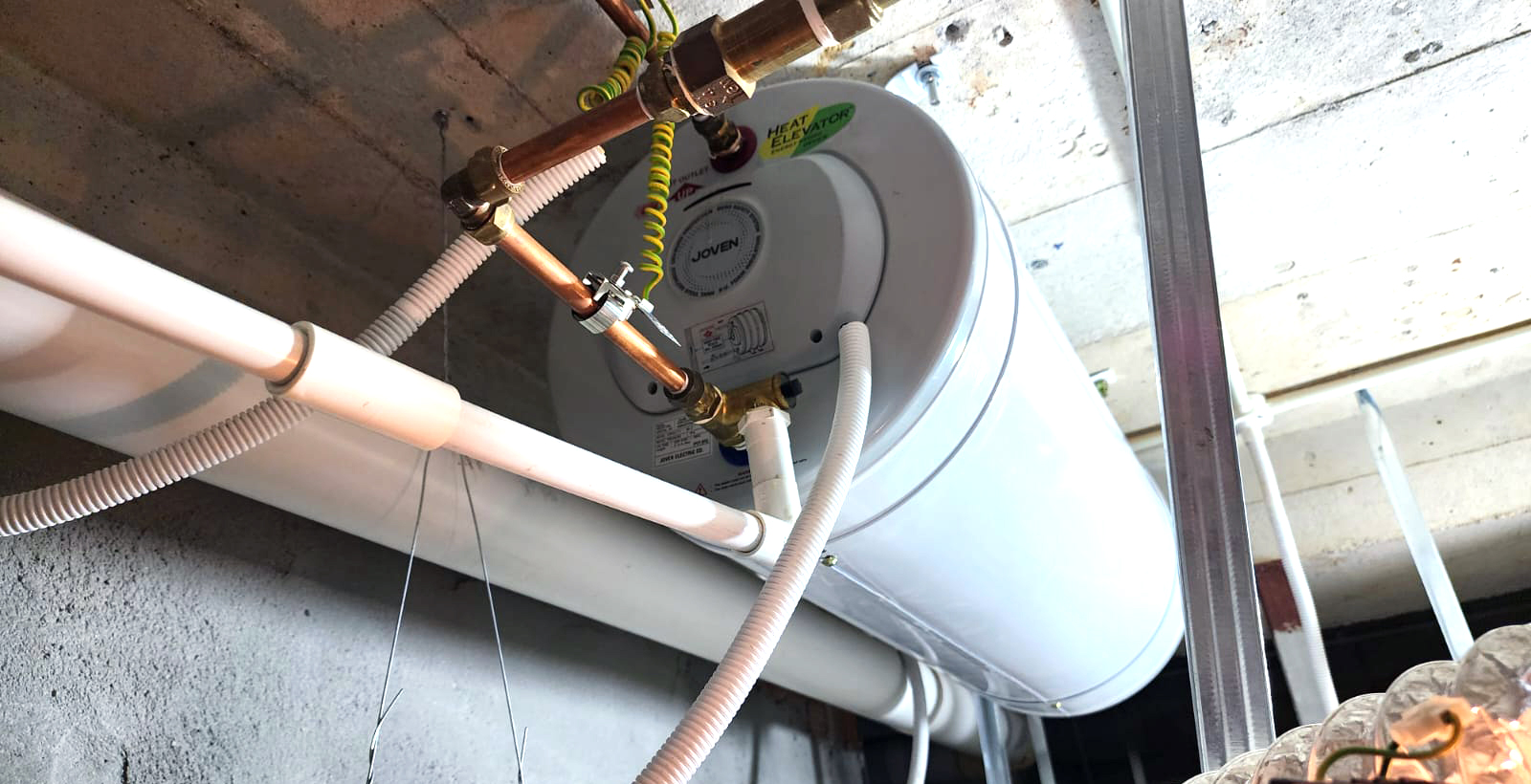 Water Heater Installation River Valley Condo - Before